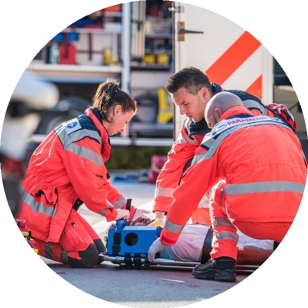 Paramedics caring for a patient